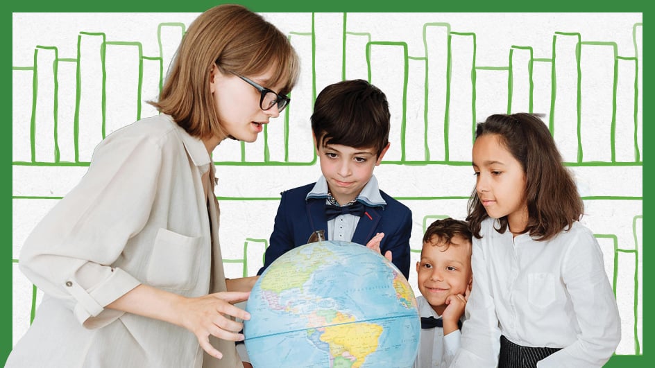 A teacher and three children look at a globe together in a classroom with a green illustrated bookshelf background. The children appear engaged and curious as the teacher points to a location on the globe.