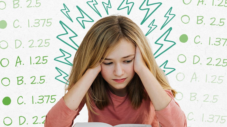 Female student holding her head in her hands sitting at a desk with an open book.